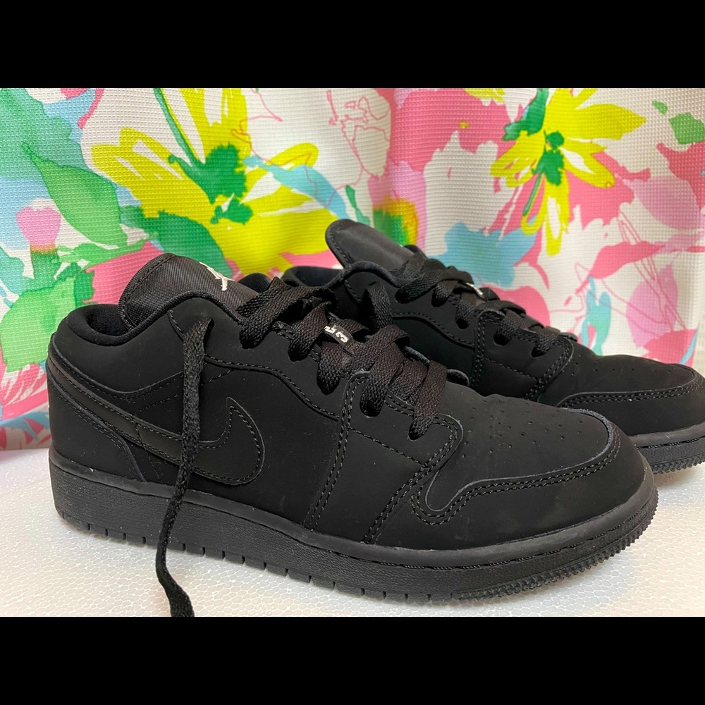 Black low-top Jordans